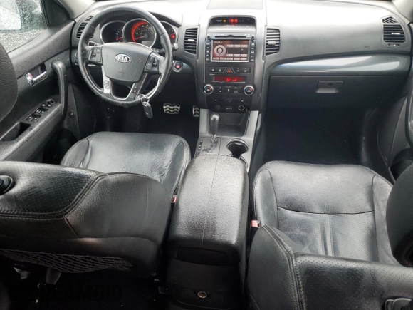 2011 Kia Sorento SX with VIN 5XYKW4A2XBG099857, listed as a Copart auction lot 56946015 with 195,457 mi miles and Salvage title. Bid and sale history available at DreamBid. Image 8.