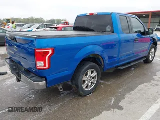 2015 Ford F-150 XL with VIN 1FTEX1C82FKD57797, listed as a IAAI auction lot 41986388 with 197,434 mi miles and . Bid and sale history available at DreamBid. Image 4.