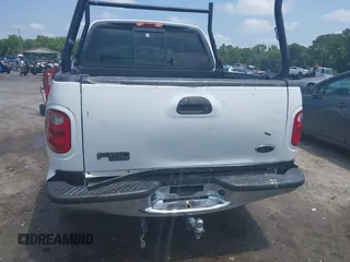2001 Ford F-150 XLT with VIN 1FTRW07L91KB77612, listed as a IAAI auction lot 42432387 with 106,574 mi miles and . Bid and sale history available at DreamBid. Image 6.
