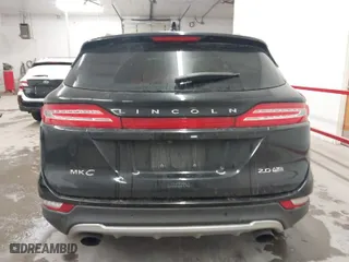 2015 Lincoln MKC with VIN 5LMCJ2A96FUJ47288, listed as a IAAI auction lot 41566290 with 102,316 mi miles. Bid and sale history available at carsss.com. Image 16.