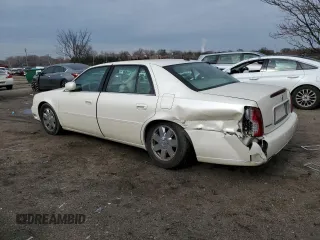 2003 Cadillac DeVille DTS z VIN 1G6KF57993U201484, wystawiony jako Copart lot #43742375 z przebiegiem 53 478 mil mil oraz Szkody całkowita. Historia ofert i sprzedaży dostępna na DreamBid. Obrazek 2.