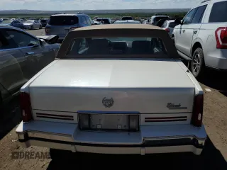 1991 Cadillac Eldorado z VIN 1G6EL13B2MU602660, wystawiony jako Copart lot #67365674 z przebiegiem 108 880 mil mil oraz Szkody całkowita. Historia ofert i sprzedaży dostępna na DreamBid. Obrazek 6.