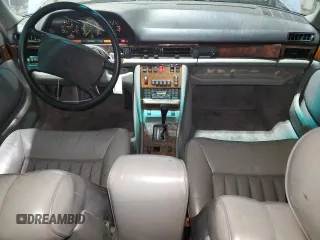 1986 Mercedes-Benz 560 with VIN WDBCA39DXGA213770, listed as a Copart auction lot 49787355 with 218,547 mi miles and Salvage Title. Bid and sale history available at DreamBid. Image 8.