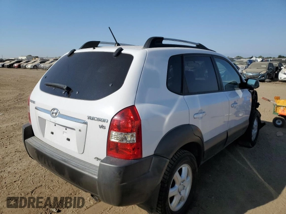 2005 Hyundai Tucson GLS with VIN KM8JN72D75U169698, listed as a Copart auction lot 71572094 with 149,706 mi miles and Salvage Title. Bid and sale history available at carsss.com. Image 3.