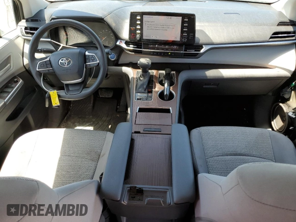 2021 Toyota Sienna LE с VIN 5TDKRKECXMS056186, выставлен на аукционе Copart как лот 57357395 с пробегом 30 580 миль миль и Списание • Salvage title. История ставок и продаж доступна на DreamBid. Изображение 8.