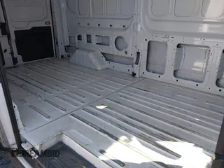 2023 Ford Transit Cargo with VIN 1FTBR2C8XPKA33372, listed as a IAAI auction lot 41735299 with 56,777 mi miles and . Bid and sale history available at DreamBid. Image 8.