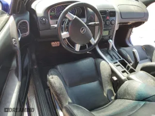 2004 Pontiac GTO with VIN 6G2VX12GX4L287389, listed as a Copart auction lot 57881874 with 107,291 mi miles and Salvage Title. Bid and sale history available at carsss.com. Image 8.