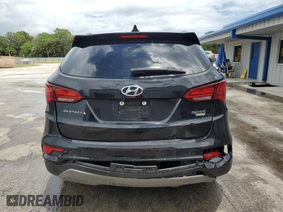 2017 Hyundai Santa Fe 2.4L with VIN 5NMZUDLB8HH048454, listed as a Copart auction lot 64727415 with 82,828 mi miles and Salvage title. Bid and sale history available at DreamBid. Image 6.