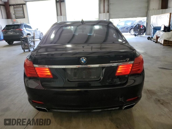 2011 BMW 7 Series with VIN WBAKX6C50BC197118, listed as a Copart auction lot 73686234 with 166,393 mi miles and Clean title. Bid and sale history available at DreamBid. Image 6.