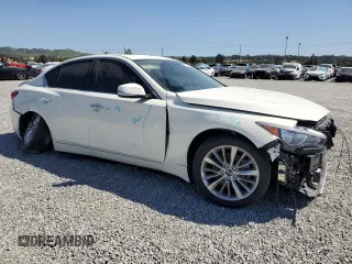 2020 Infiniti Q50 Luxe with VIN JN1EV7AP5LM206958, listed as a Copart auction lot 47239285 with 23,283 mi miles and Salvage title. Bid and sale history available at DreamBid. Image 4.