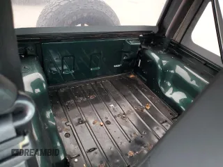 1999 Jeep Wrangler Sport z VIN 1J4FY19SXXP427968, wystawiony jako Copart lot #50102855 z przebiegiem 174 381 mil mil oraz Czysty tytuł • Clean title. Historia ofert i sprzedaży dostępna na DreamBid. Obrazek 10.