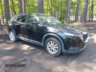 2016 Mazda CX-9 Sport with VIN JM3TCABY8G0112981, listed as a IAAI auction lot 42093389 with 106,384 mi miles. Bid and sale history available at carsss.com. Image 1.