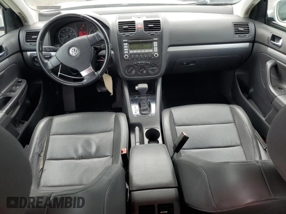 2009 Volkswagen Jetta SE z VIN 3VWRM71K39M057367, wystawiony jako Copart lot #58745235 z przebiegiem 130 647 mil mil oraz Szkoda całkowita • Salvage title. Historia ofert i sprzedaży dostępna na DreamBid. Obrazek 8.