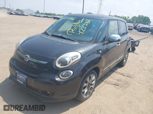 2014 FIAT 500L Lounge with VIN ZFBCFACH1EZ003031, listed as a IAAI auction lot 42232861 with 104,496 mi miles and . Bid and sale history available at DreamBid. Image 2.