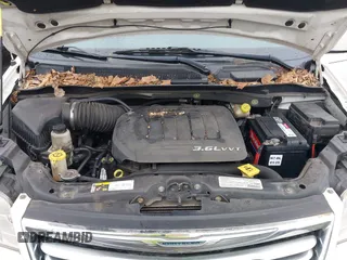2013 Chrysler Town & Country Touring with VIN 2C4RC1BG7DR629829, listed as a IAAI auction lot 42152230 with 188,473 mi miles. Bid and sale history available at carsss.com. Image 10.