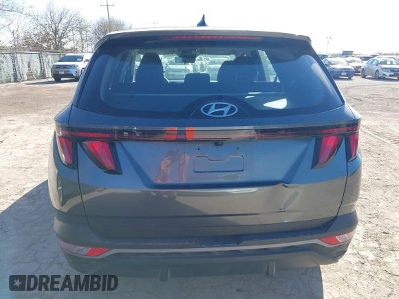 2022 Hyundai Tucson SE with VIN 5NMJA3AE4NH024581, listed as a IAAI auction lot 41725035 with 49,696 mi miles and . Bid and sale history available at carsss.com. Image 16.