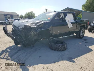 2018 Chevrolet Silverado 1500 LT with VIN 3GCUKRECXJG503244, listed as a Copart auction lot 52792825 with 107,029 mi miles and Salvage Title. Bid and sale history available at DreamBid. Image 1.