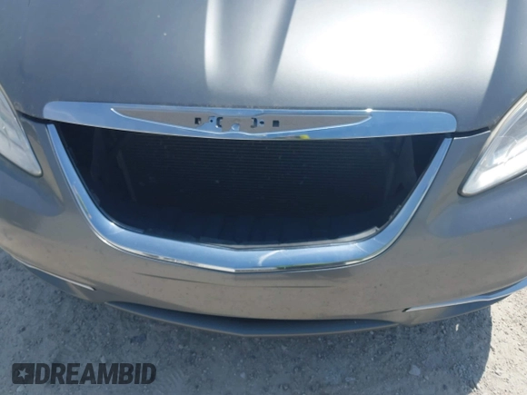 2012 Chrysler 200 Limited with VIN 1C3CCBCB1CN308772, listed as a IAAI auction lot 42187662 with 243,483 mi miles and . Bid and sale history available at DreamBid. Image 16.