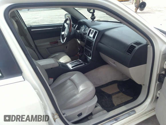 2005 Chrysler 300 with VIN 2C3JA63H65H144648, listed as a IAAI auction lot 41762730 with 125,757 mi miles. Bid and sale history available at carsss.com. Image 5.