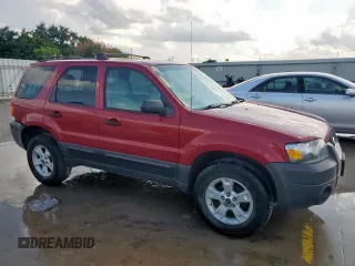 2006 Ford Escape XLT with VIN 1FMYU03196KA38458, listed as a Copart auction lot 64194705 with 102,097 mi miles and Salvage title. Bid and sale history available at DreamBid. Image 4.
