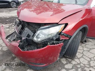 2016 Nissan Rogue SV with VIN JN8AT2MT3GW027636, listed as a IAAI auction lot 40953471 with 128,639 mi miles and . Bid and sale history available at carsss.com. Image 6.