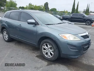 2012 Mazda CX-9 Sport z VIN JM3TB2BV5C0352465, wystawiony jako IAAI lot #42415093 z przebiegiem 143 385 mil mil oraz . Historia ofert i sprzedaży dostępna na DreamBid. Obrazek 1.