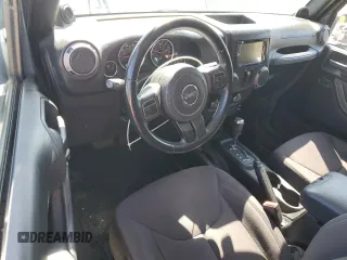 2014 Jeep Wrangler Sport z VIN 1C4AJWAG9EL117954, wystawiony jako Copart lot #65821725 z przebiegiem 137 383 mil mil oraz Czysty tytuł • Clean title. Historia ofert i sprzedaży dostępna na DreamBid. Obrazek 8.