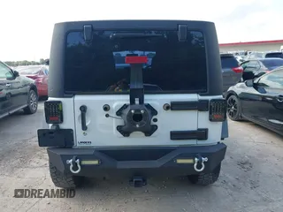 2016 Jeep Wrangler Unlimited Sport RHD z VIN 1C4BJWKG3GL293694, wystawiony jako IAAI lot #42569773 z przebiegiem 140 243 mil mil oraz . Historia ofert i sprzedaży dostępna na DreamBid. Obrazek 16.