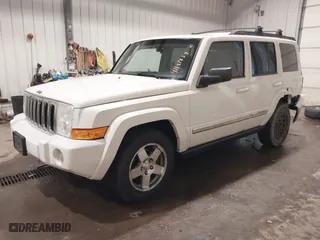 2010 Jeep Commander Sport with VIN 1J4RG4GK7AC132121, listed as a IAAI auction lot 41187854 with 155,413 mi miles. Bid and sale history available at carsss.com. Image 18.