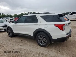 2023 Ford Explorer XLT with VIN 1FMSK7DH9PGA46662, listed as a Copart auction lot 59389215 with 27,382 mi miles and Salvage title. Bid and sale history available at DreamBid. Image 2.