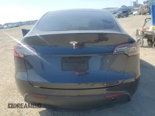 2024 Tesla Model Y с VIN 7SAYGDED2RF100152, выставлен на аукционе Copart как лот 52133535 с пробегом 7 632 миль миль и Списание • Salvage title. История ставок и продаж доступна на DreamBid. Изображение 6.