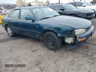 1996 Toyota Camry LE with VIN 4T1BF12K3TU117205, listed as a IAAI auction lot 41442848 with 137,829 mi miles and . Bid and sale history available at DreamBid. Image 1.