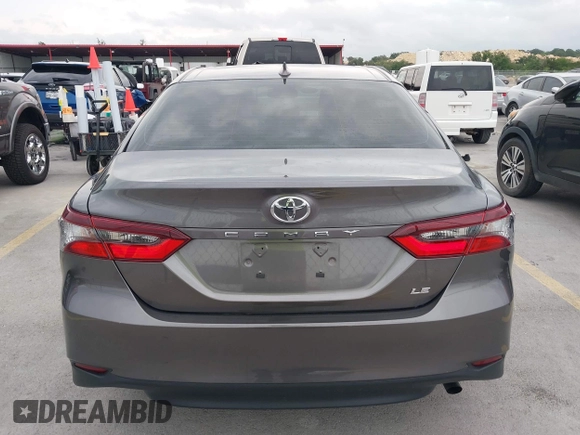 2023 Toyota Camry LE z VIN 4T1R11AK1PU169839, wystawiony jako IAAI lot #42140135 z przebiegiem 10 808 mil mil oraz . Historia ofert i sprzedaży dostępna na DreamBid. Obrazek 16.