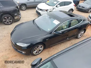 2014 Tesla Model S 60 with VIN 5YJSA1H10EFP34137, listed as a IAAI auction lot 42311565 with Not provided miles and . Bid and sale history available at DreamBid. Image 18.