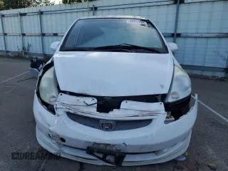 2007 Honda Fit Sport with VIN JHMGD386X7S048180, listed as a Copart auction lot 74252494 with 112,828 mi miles and Salvage Title. Bid and sale history available at carsss.com. Image 5.