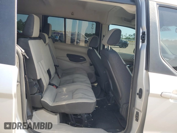2015 Ford Transit Connect XLT z VIN NM0GE9F77F1196544, wystawiony jako Copart lot #61072155 z przebiegiem 183 489 mil mil oraz Szkoda całkowita • Salvage title. Historia ofert i sprzedaży dostępna na DreamBid. Obrazek 11.