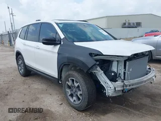 2023 Honda Passport TrailSport with VIN 5FNYF8H62PB024269, listed as a IAAI auction lot 42087461 with 20,670 mi miles and . Bid and sale history available at DreamBid. Image 1.