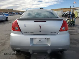 2009 Pontiac G6 with VIN 1G2ZL577094232011, listed as a Copart auction lot 77175054 with 133,353 mi miles and Salvage title. Bid and sale history available at DreamBid. Image 6.