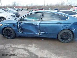 2019 Ford Fusion Energi Titanium with VIN 3FA6P0SU0KR111372, listed as a IAAI auction lot 41685702 with 107,407 mi miles. Bid and sale history available at carsss.com. Image 6.