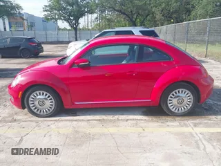 2013 Volkswagen Beetle 2.5L w/Sun/Sound/Nav with VIN 3VWJX7AT4DM672158, listed as a IAAI auction lot 42187543 with 94,961 mi miles and . Bid and sale history available at DreamBid. Image 14.