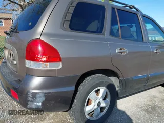 2005 Hyundai Santa Fe GLS with VIN KM8SC13D15U013890, listed as a IAAI auction lot 41917783 with 227,891 mi miles. Bid and sale history available at carsss.com. Image 14.
