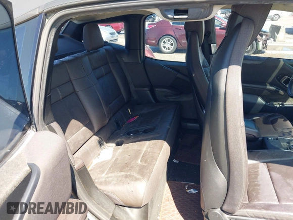 2015 BMW i3 z VIN WBY1Z2C50FV287637, wystawiony jako IAAI lot #42077747 z przebiegiem 67 283 mil mil oraz . Historia ofert i sprzedaży dostępna na DreamBid. Obrazek 8.