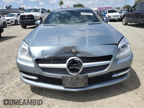 2012 Mercedes-Benz SLK 350 with VIN WDDPK5HA9CF017809, listed as a Copart auction lot 56926895 with 106,692 mi miles and Clean title. Bid and sale history available at DreamBid. Image 5.