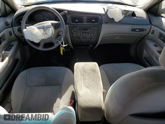 2000 Ford Taurus SE with VIN 1FAFP53U3YG259124, listed as a Copart auction lot 77363344 with 154,889 mi miles and Salvage Title. Bid and sale history available at DreamBid. Image 8.