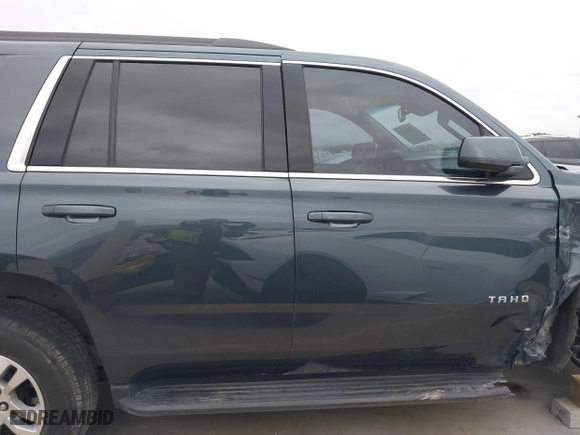 2019 Chevrolet Tahoe LT with VIN 1GNSCBKC8KR366460, listed as a IAAI auction lot 41384327 with 76,861 mi miles. Bid and sale history available at carsss.com. Image 14.