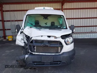 2021 Ford Transit Cargo with VIN 1FTBR1C86MKA10399, listed as a IAAI auction lot 42074285 with 55,572 mi miles and . Bid and sale history available at DreamBid. Image 12.