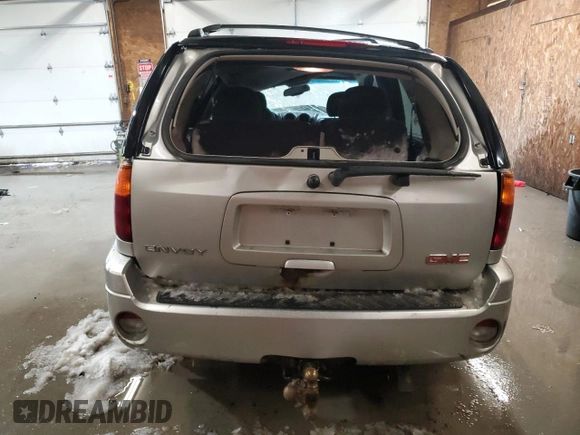 2007 GMC Envoy SLE with VIN 1GKDT13S572301992, listed as a Copart auction lot 87404174 with 131,741 mi miles and Salvage Title. Bid and sale history available at carsss.com. Image 6.