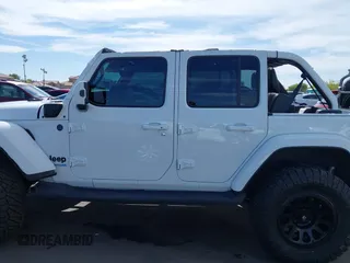 2021 Jeep Wrangler Unlimited Sahara with VIN 1C4JJXP63MW716690, listed as a IAAI auction lot 42087879 with 40,889 mi miles and . Bid and sale history available at DreamBid. Image 14.