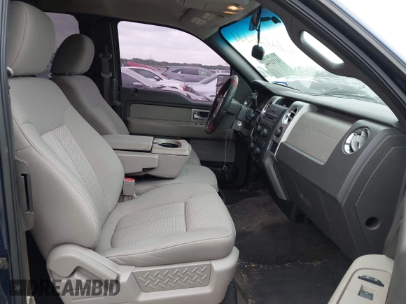 2009 Ford F-150 STX with VIN 1FTRX12889FA97356, listed as a IAAI auction lot 42121444 with 166,010 mi miles and . Bid and sale history available at DreamBid. Image 5.