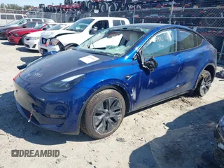 2025 Tesla Model Y Long Range with VIN 7SAYGDEEXSA346006, listed as a IAAI auction lot 41835610 with 1,896 mi miles and . Bid and sale history available at carsss.com. Image 17.